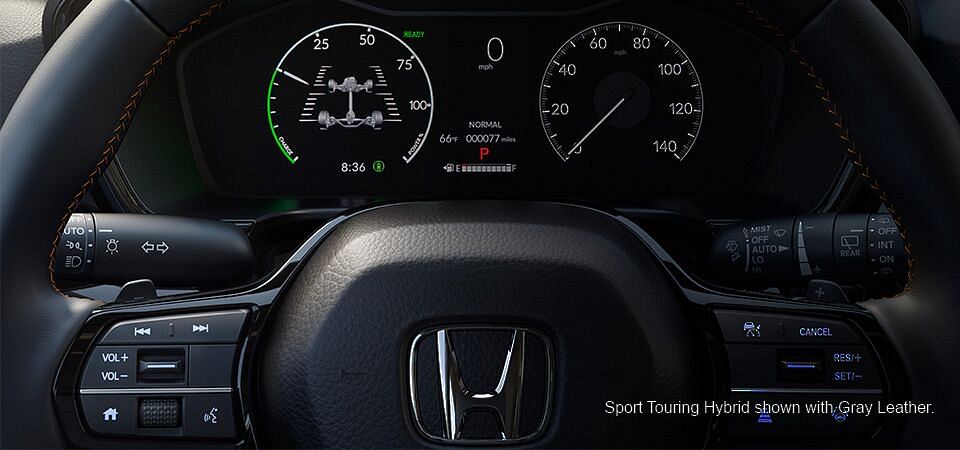 Driver information interface and steering wheel in 2023 Sport Touring Hybrid Honda with Gray lether interior