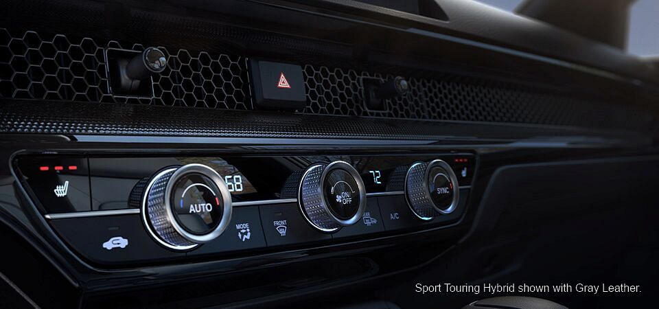 Air conditioning control panel in 2023 Honda Sport Touring Hybrid with Gray Leather interior